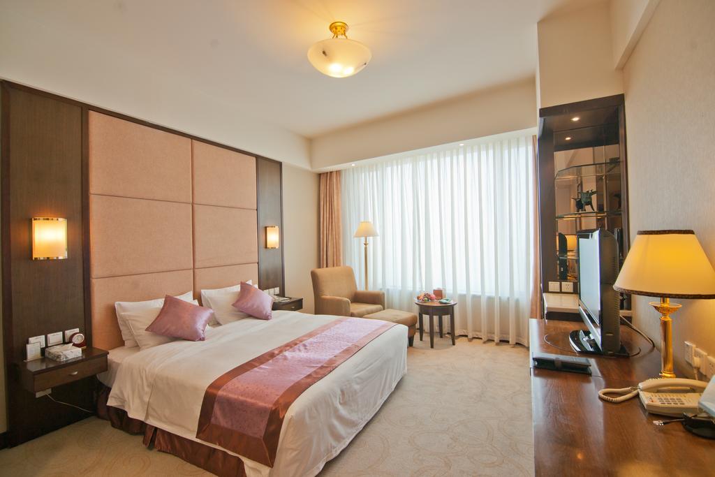 Weihai Golden Bay International Hotel Quarto foto
