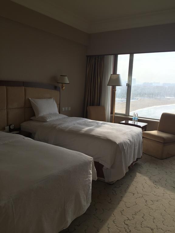 Weihai Golden Bay International Hotel Quarto foto